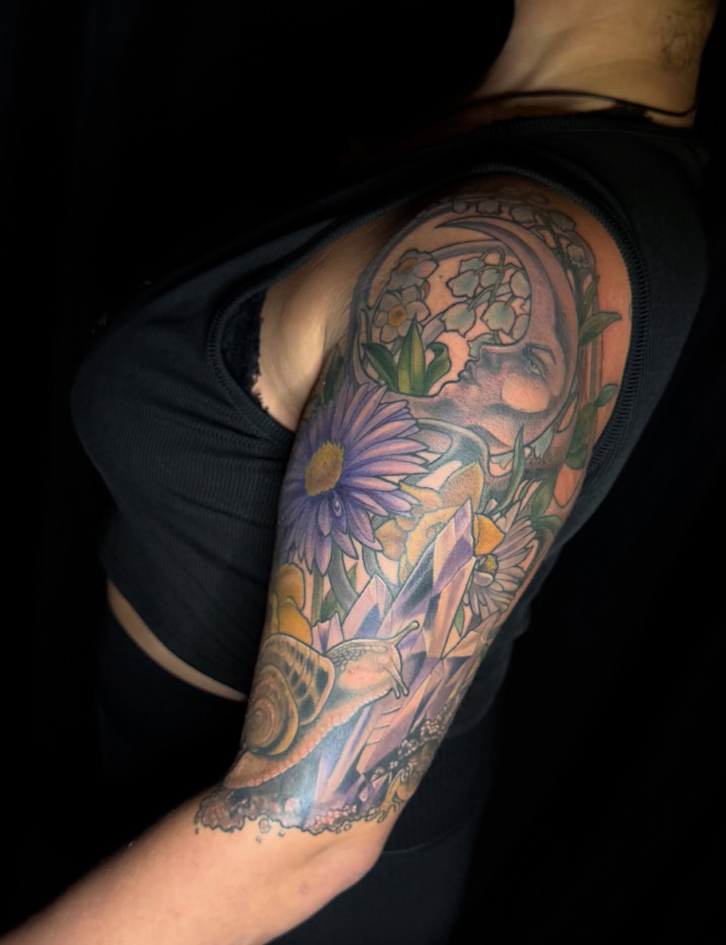 Floral arrangement new school tattoo on the shoulder by Em ✨PA Tattooer