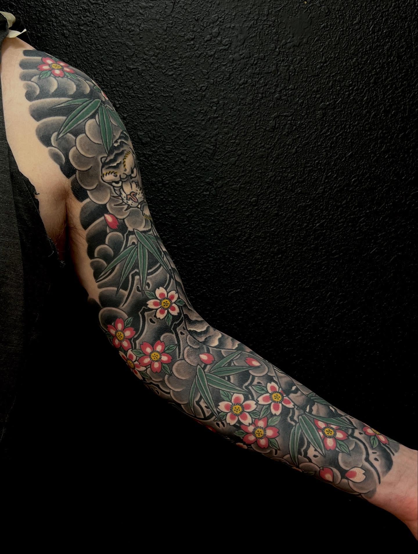 Cherry blossoms and bamboo japanese irezumi tattoo on the forearm by Rocky Burley, Georgetown, Texas