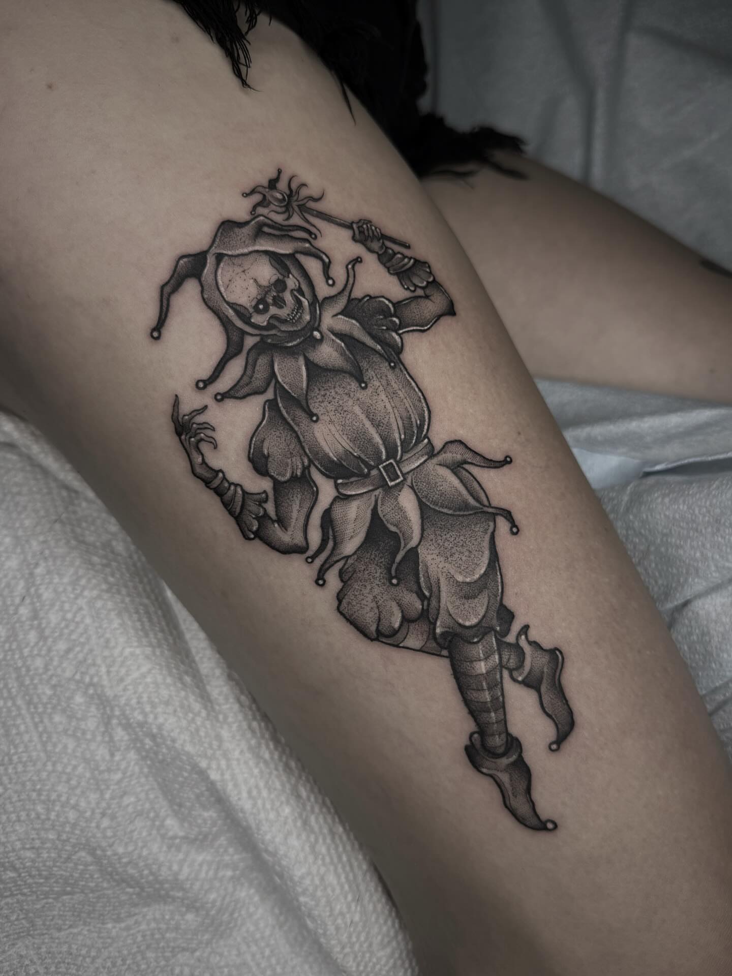 Jester black and grey tattoo on the thigh by π· C a t B l a c k π·οΈ