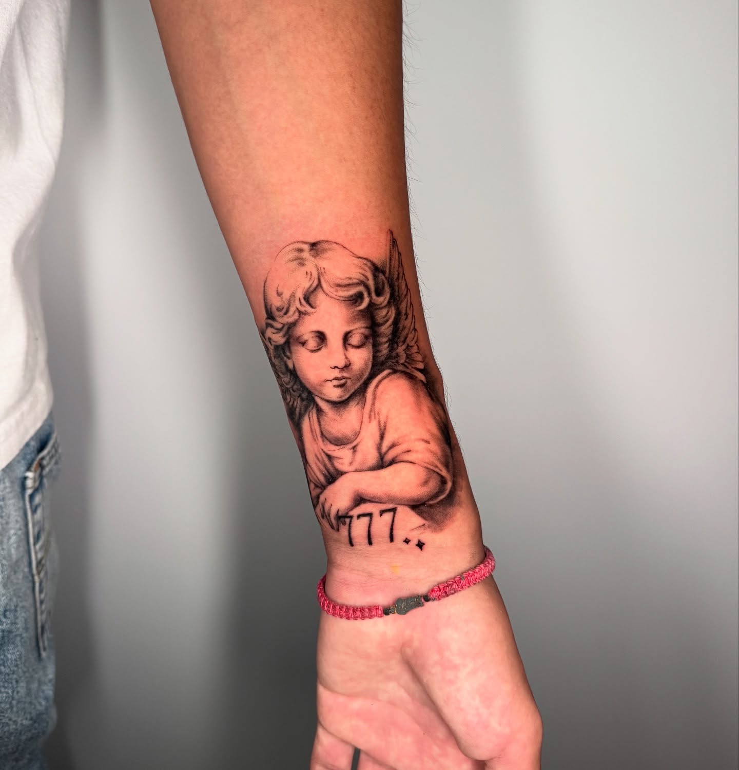 Angel with wings realism tattoo on the forearm by Moi Rivas, Salt Lake City, Utah