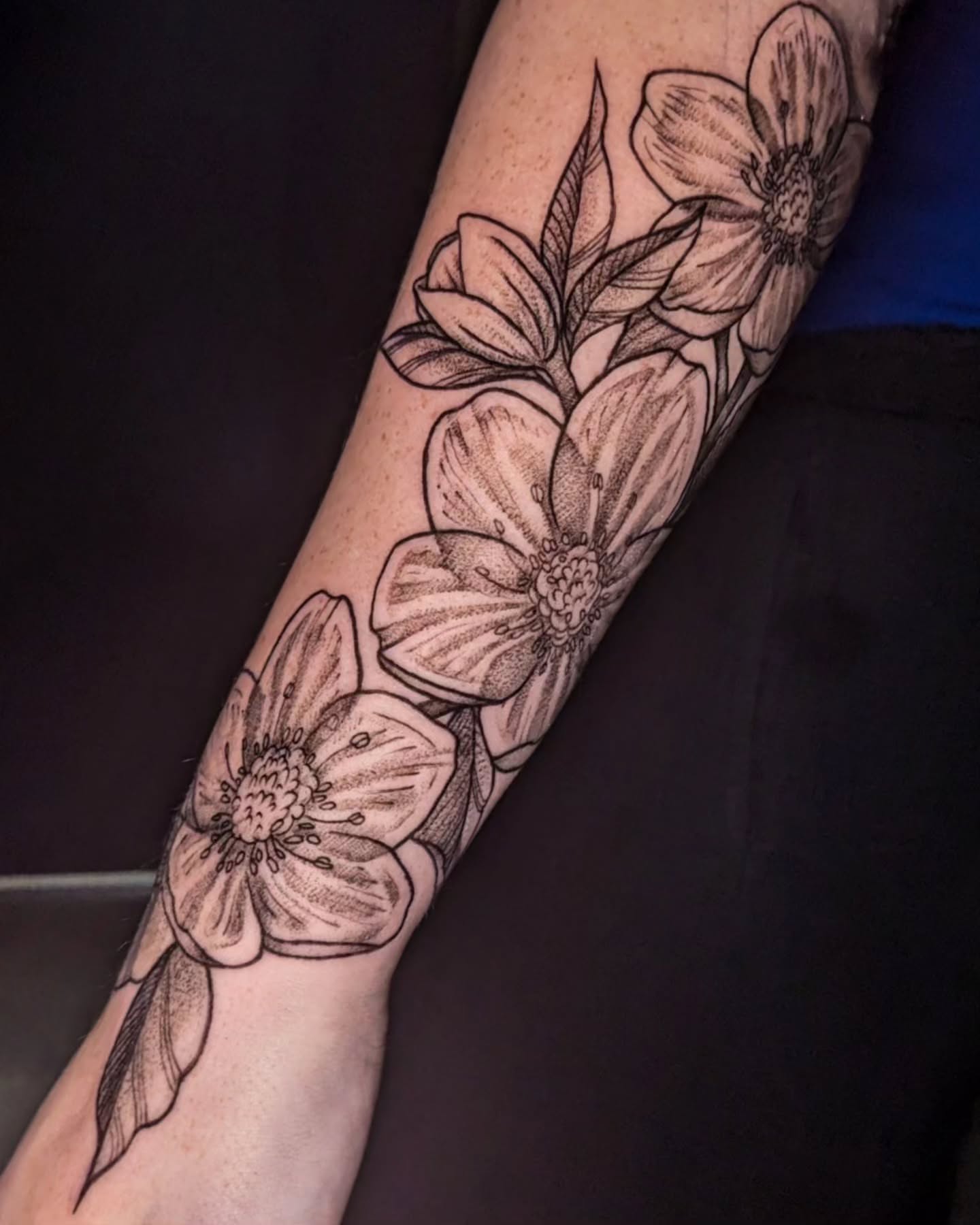 Flowers black and grey tattoo on the forearm by robin ✨ portland tattoo artist