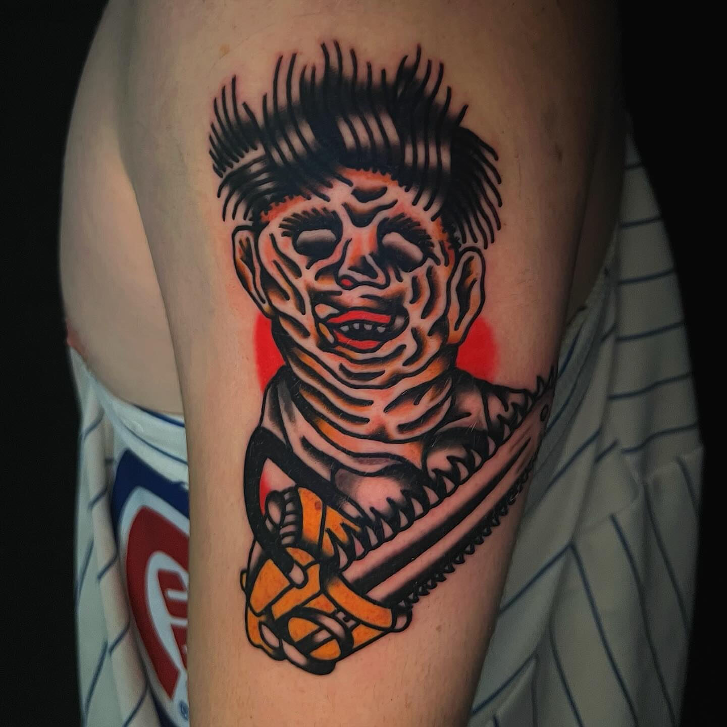Man with mohawk American traditional tattoo on the forearm by Benjamin Ward
