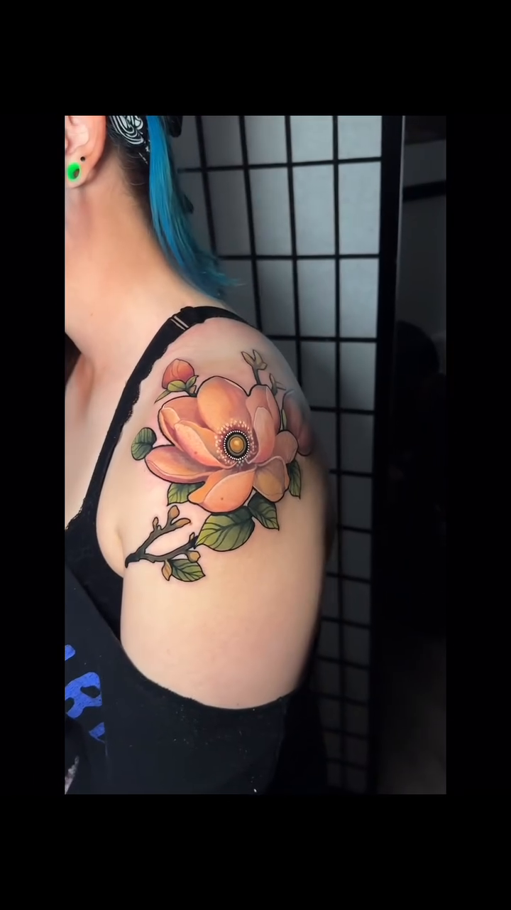 Magnolia flower neo-traditional tattoo by Joe Friedman