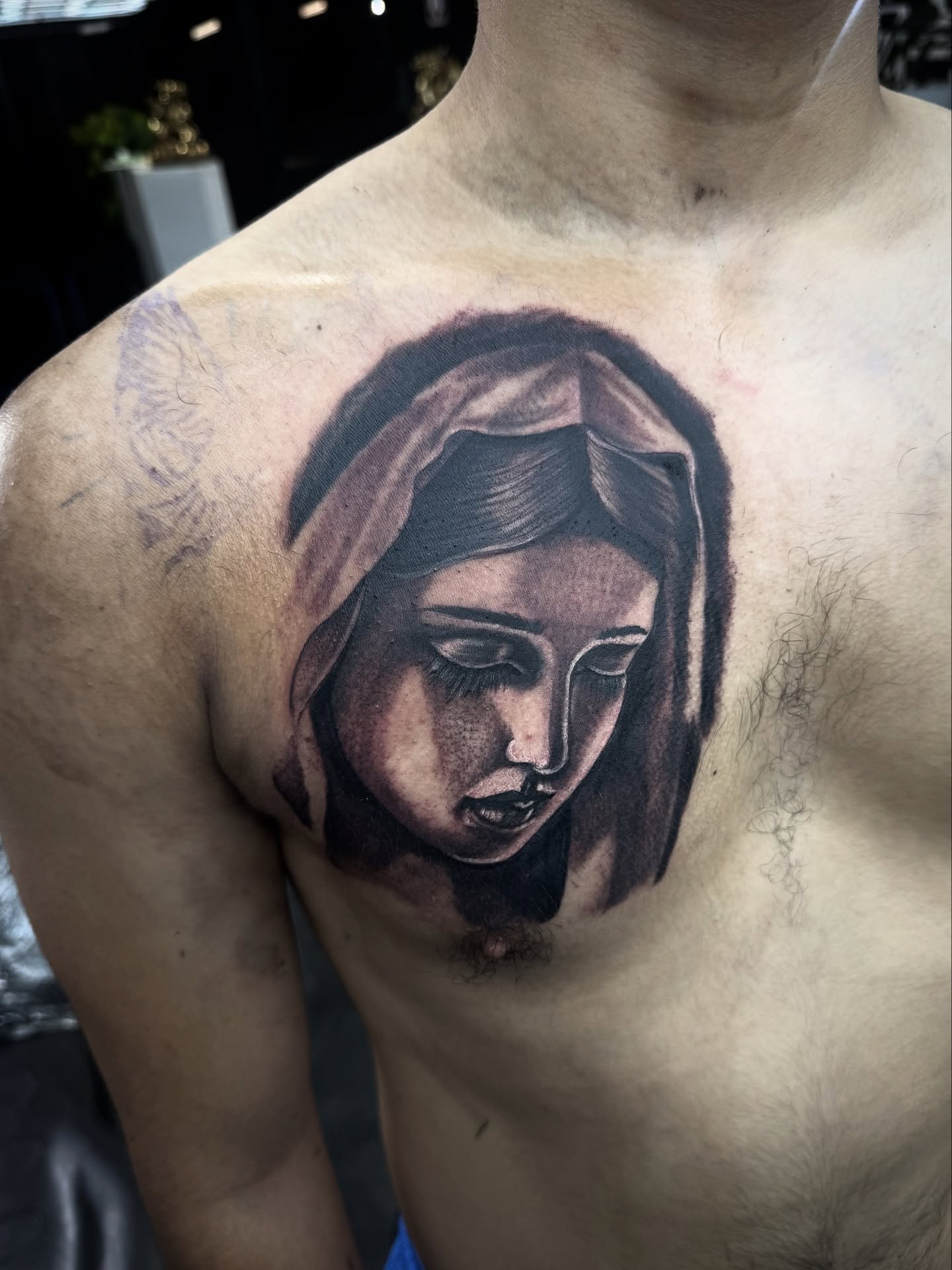 Religious figure realism tattoo on the chest by ♟️SouthEastLA♟️