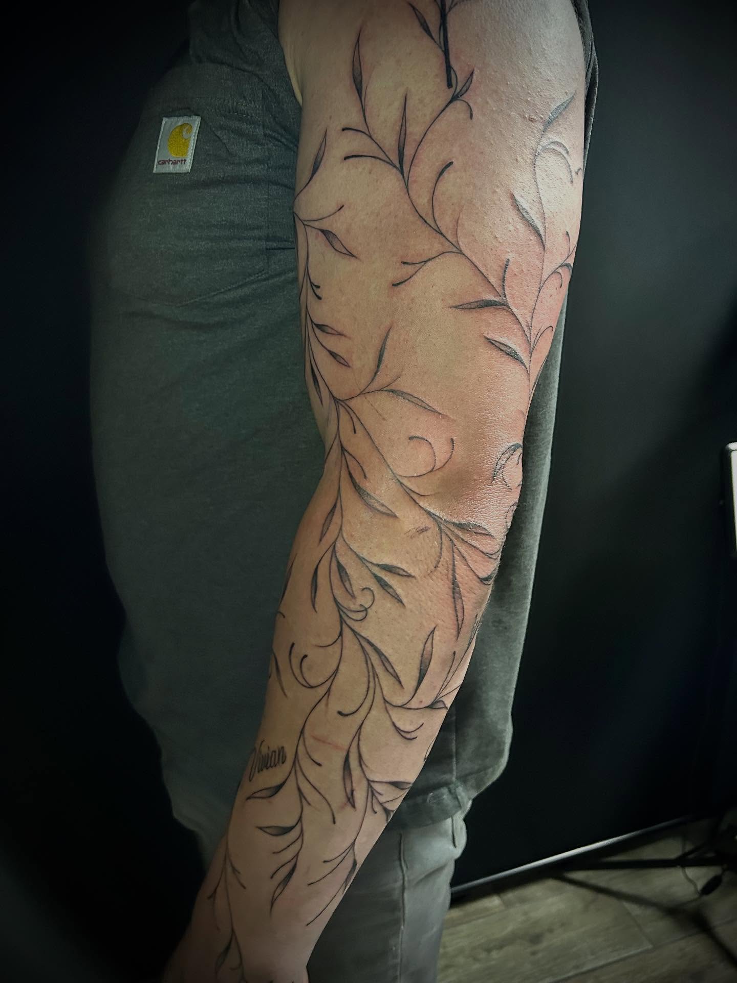Feather black and grey tattoo on the forearm by ✶ 𝓑𝓲𝓽𝓮𝓼𝓲𝔃𝓮𝓭 𝓘𝓷𝓴 ✶, Buford, Georgia