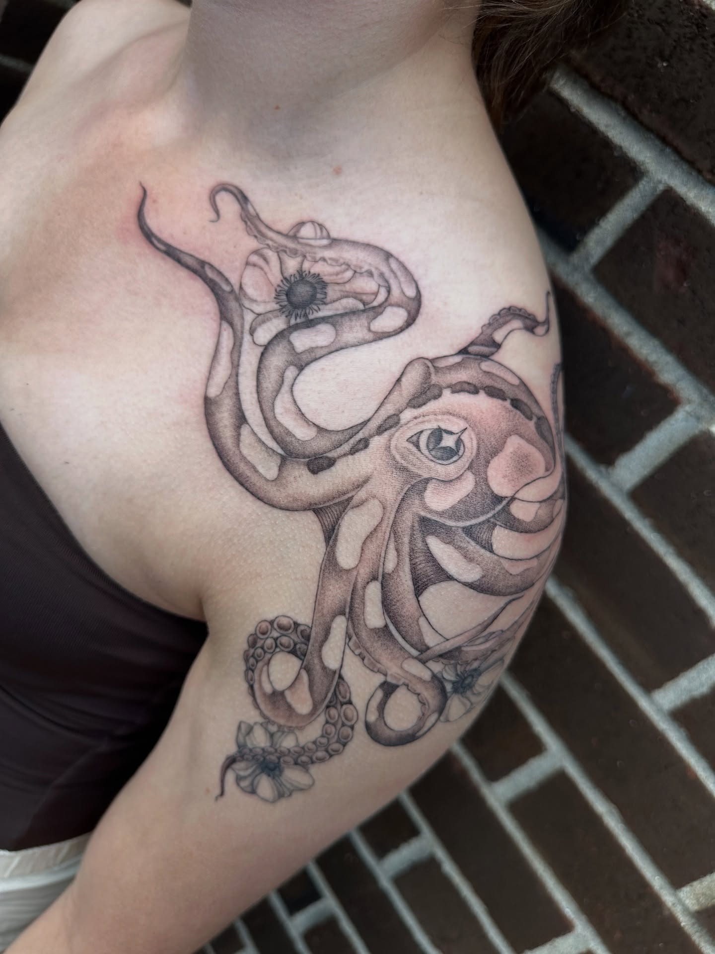 Octopus and snake realism tattoo on the shoulder by Hail Chaney, Somerville, Massachusetts