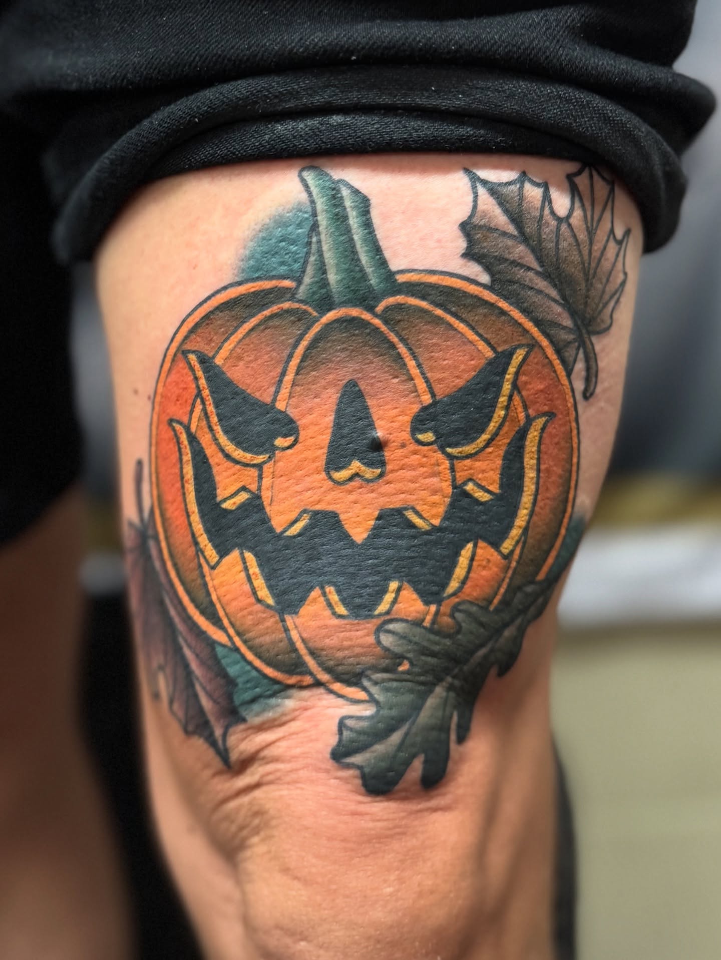 Pumpkin American traditional tattoo on the thigh by Casket