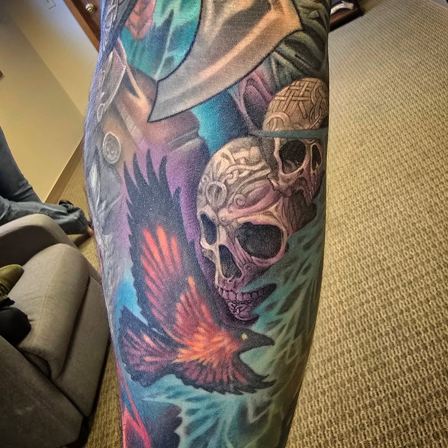 Skull and bird realism tattoo on the forearm by Alexander L. Wolff, Rapid City, South Dakota
