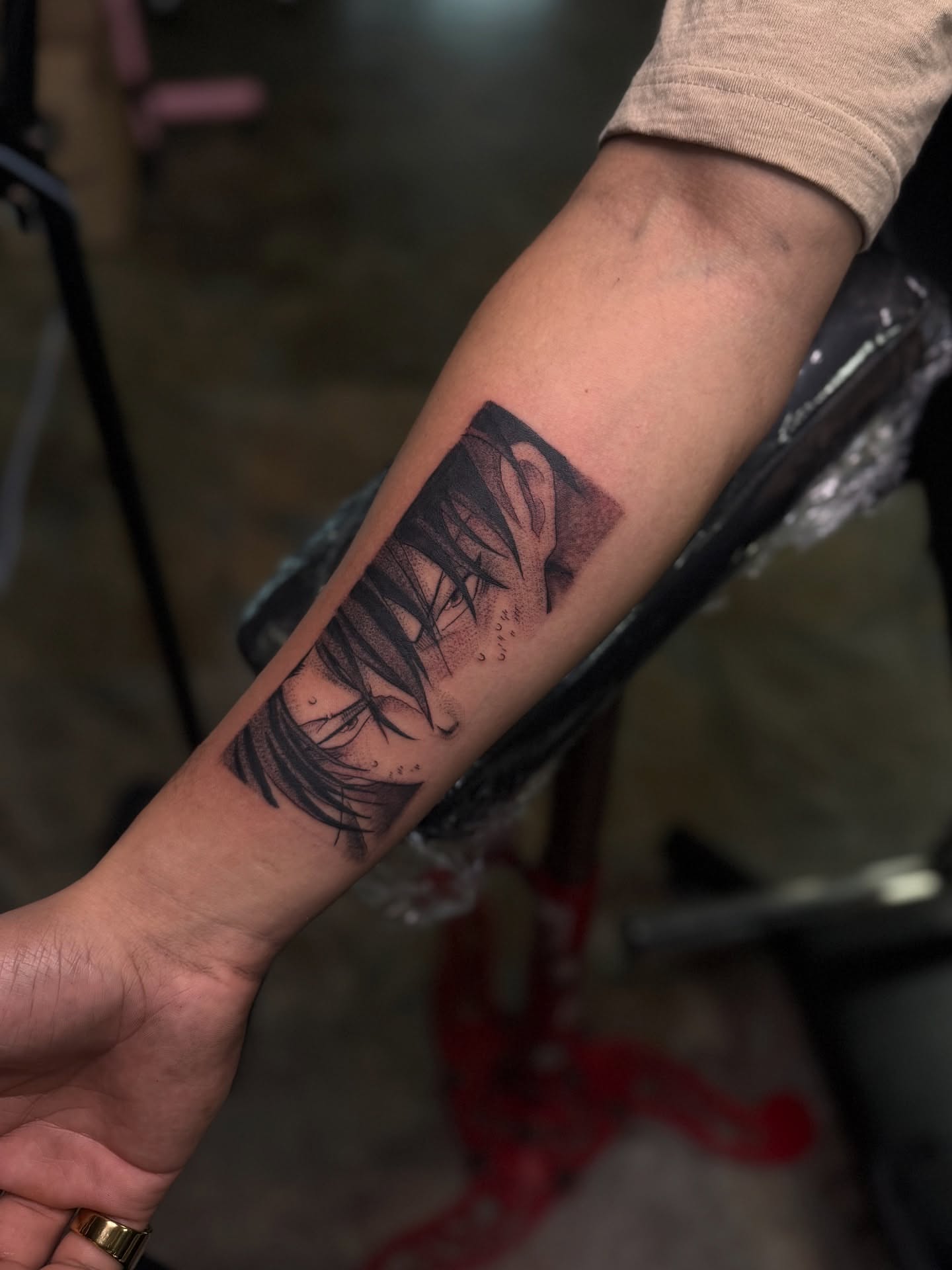 Abstract feathers black and grey tattoo on the forearm by Yohana Vargas