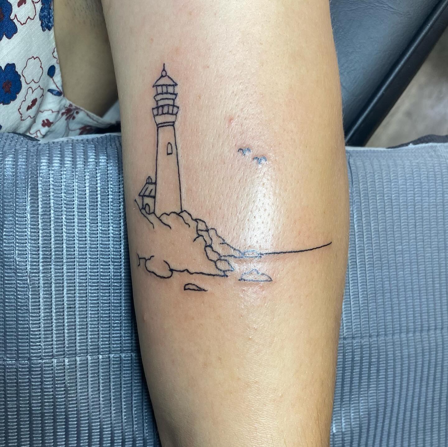 Lighthouse minimalist tattoo on the forearm by MD Ariel🦷