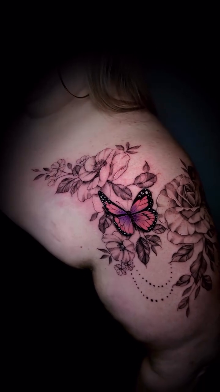 Butterfly and roses fine line tattoo on the shoulder by Nyc Tattoo Manhattan