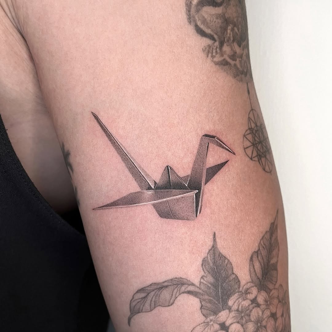 Tattoo by @nuku_tattoo — realism, black_and_grey