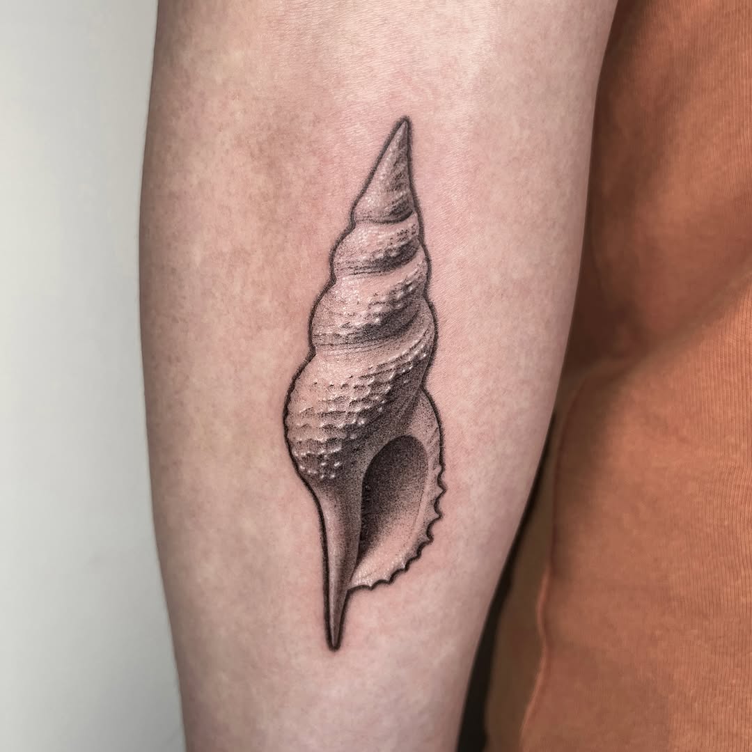 Tattoo by @nuku_tattoo — realism, dotwork