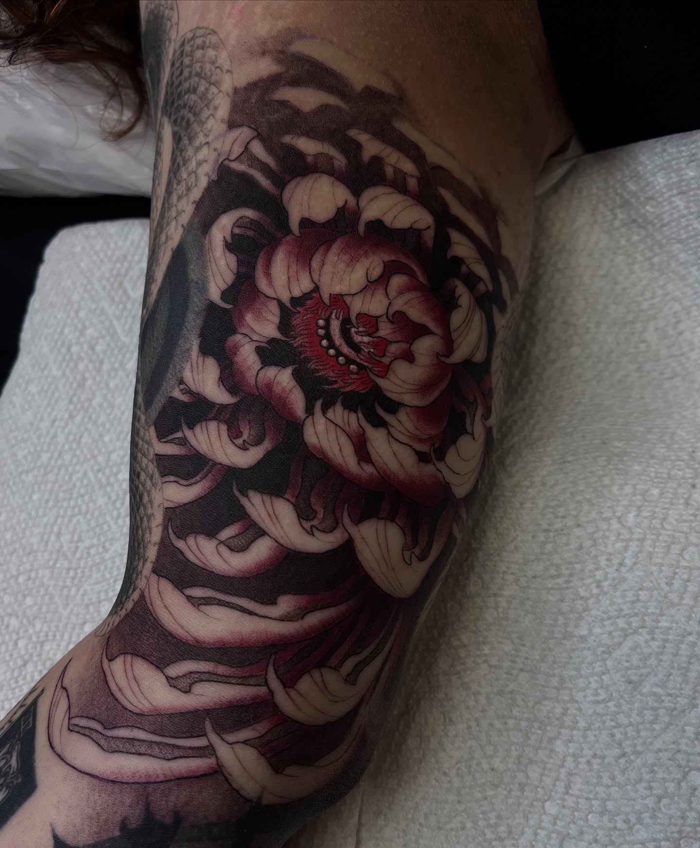 Snake and peony japanese irezumi tattoo on the forearm by ๐๐๐๐๐๐๐