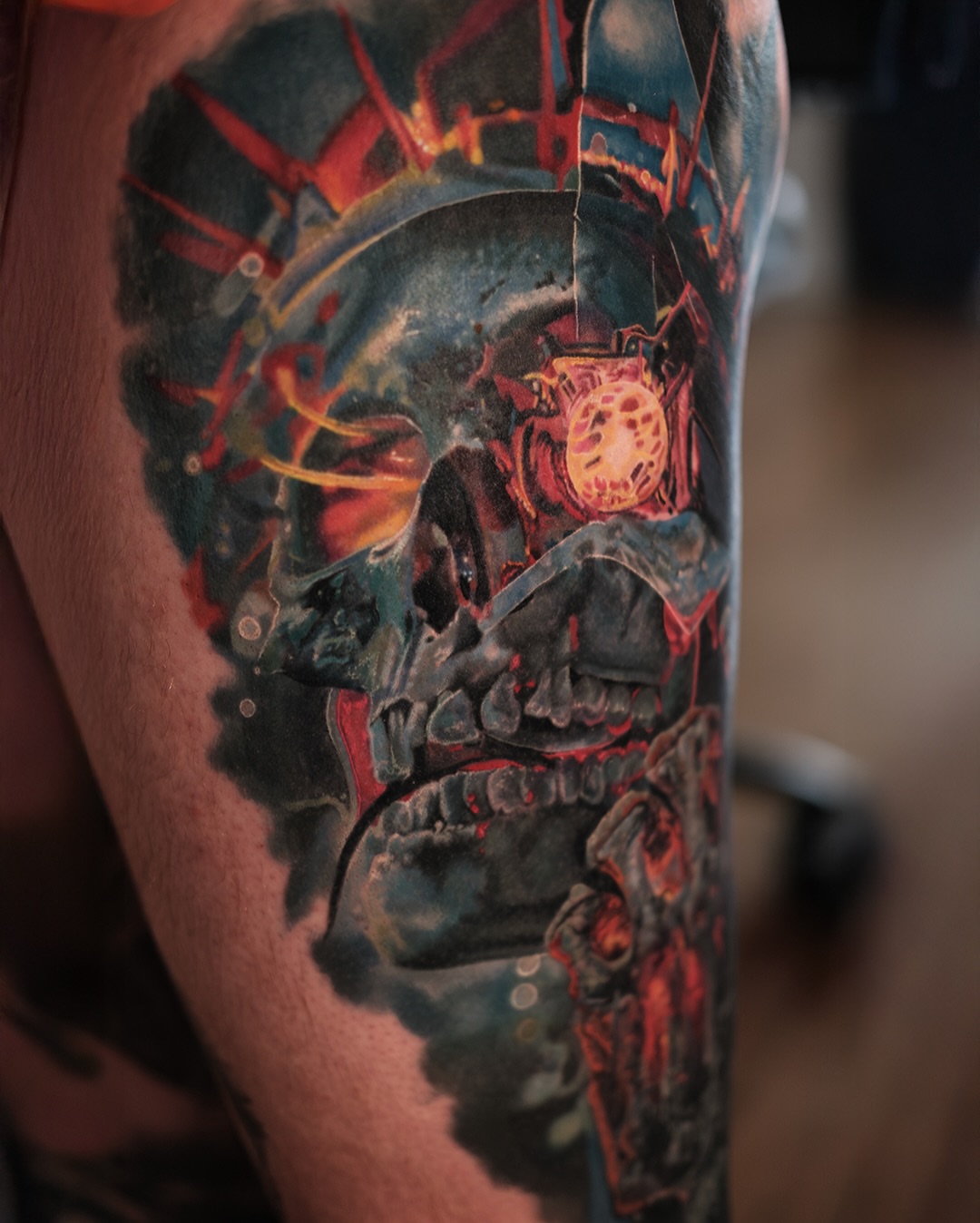 Cyborg skull dark realism tattoo on the forearm by Justin Shelpman