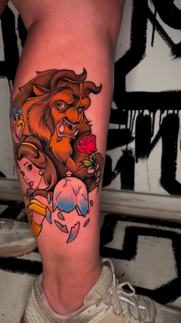 Beauty and the Beast characters new school tattoo on the leg by Nick Andrade Las Vegas Tattoo Artist