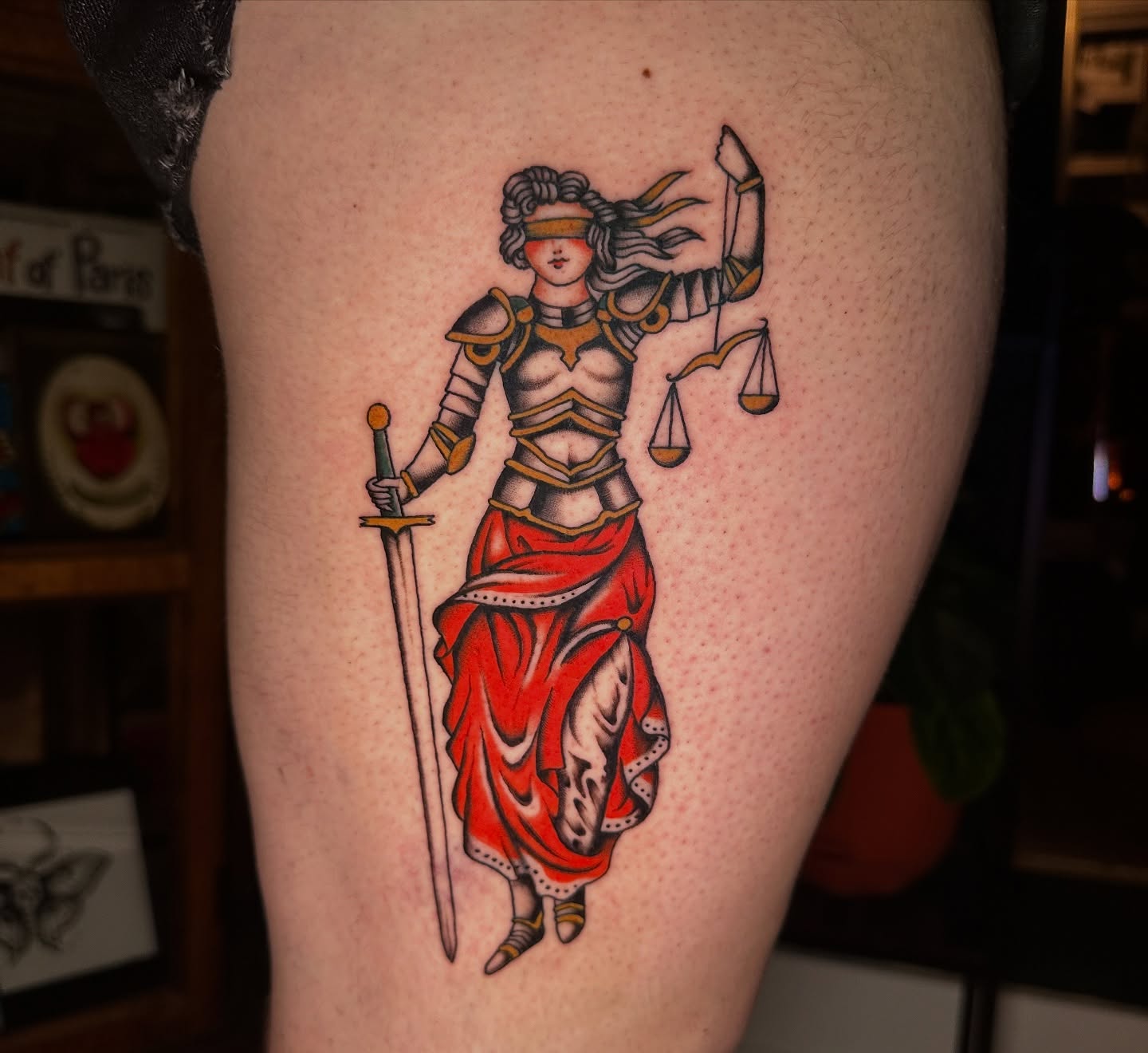 Lady Justice neo-traditional tattoo on the thigh by Max Peterson