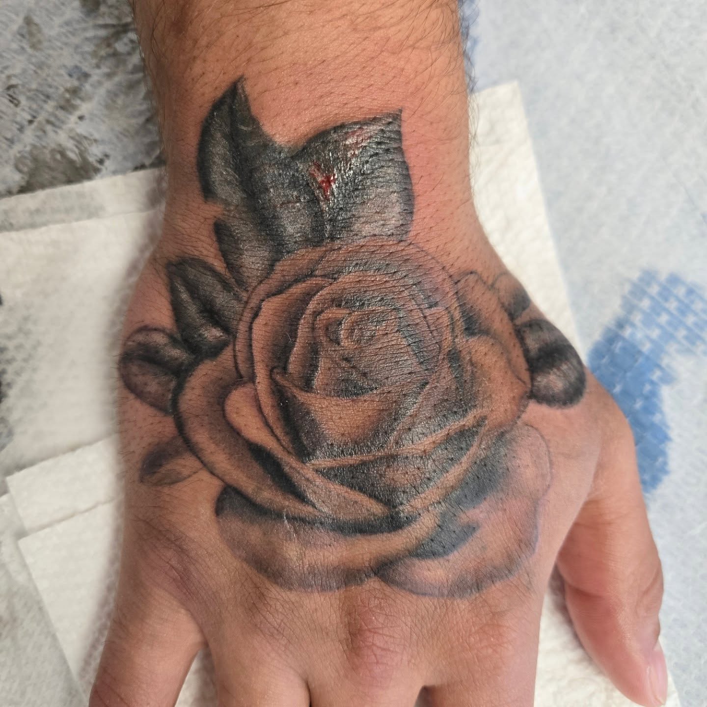 Rose black and grey tattoo on the hand by Jose G. Rubio Tattoo Artist πΊπ²ππ¨π¦