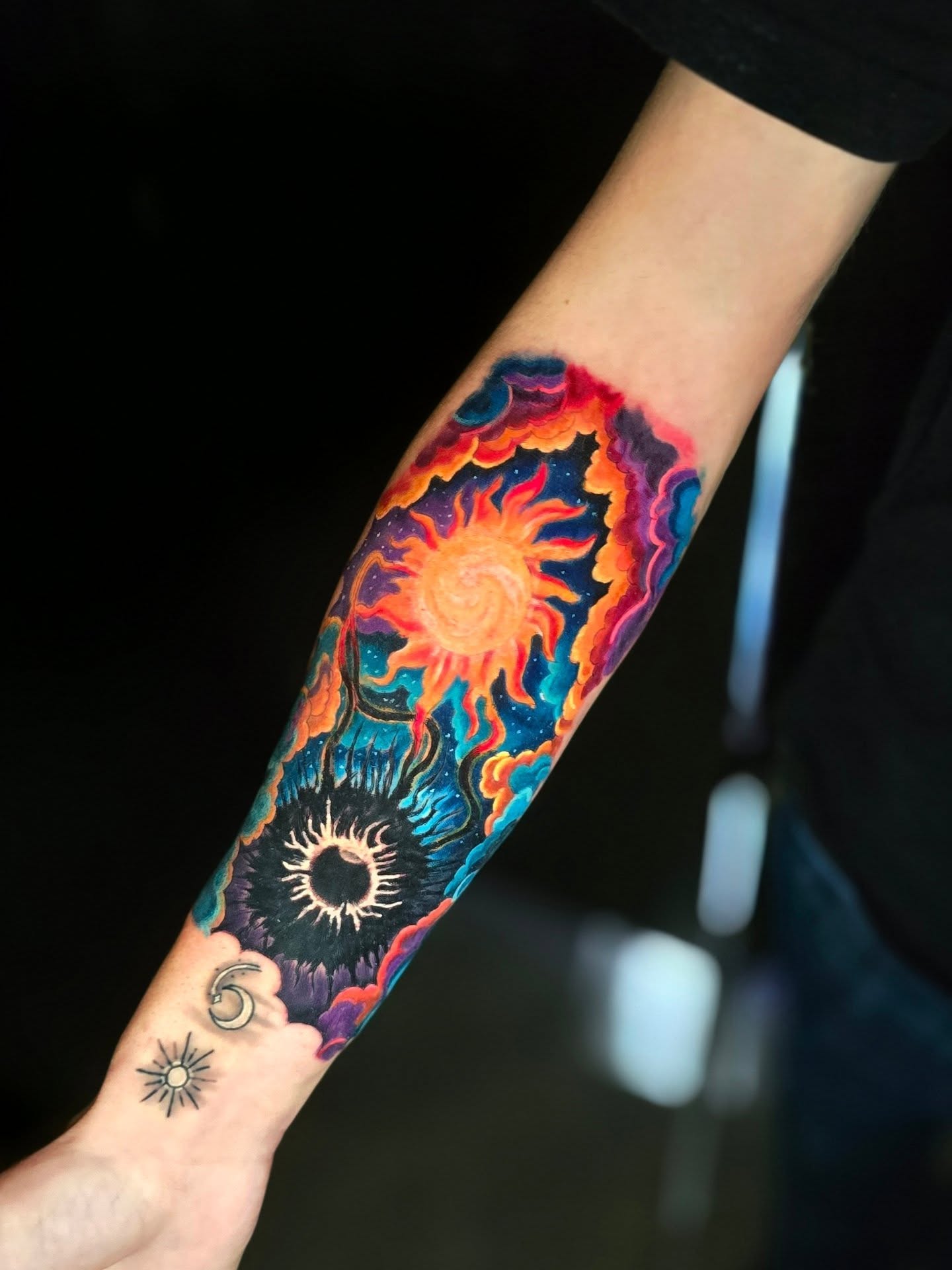 Solar system new school tattoo on the forearm by Myth & Mercy Tattoo Co.