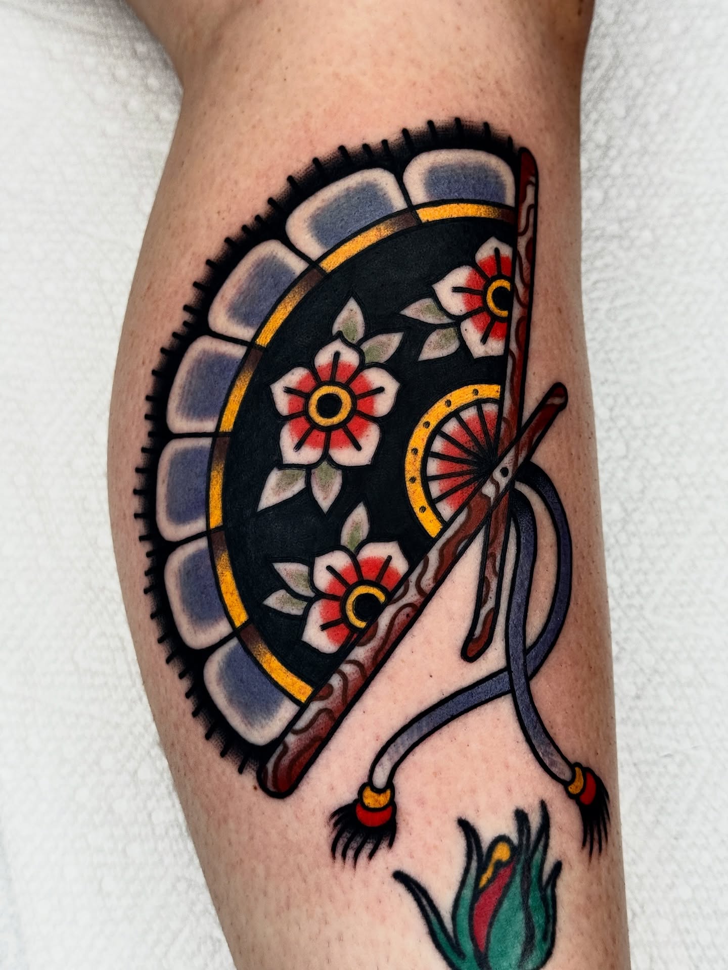 Pizza slice American traditional tattoo on the forearm by Butch Mickle
