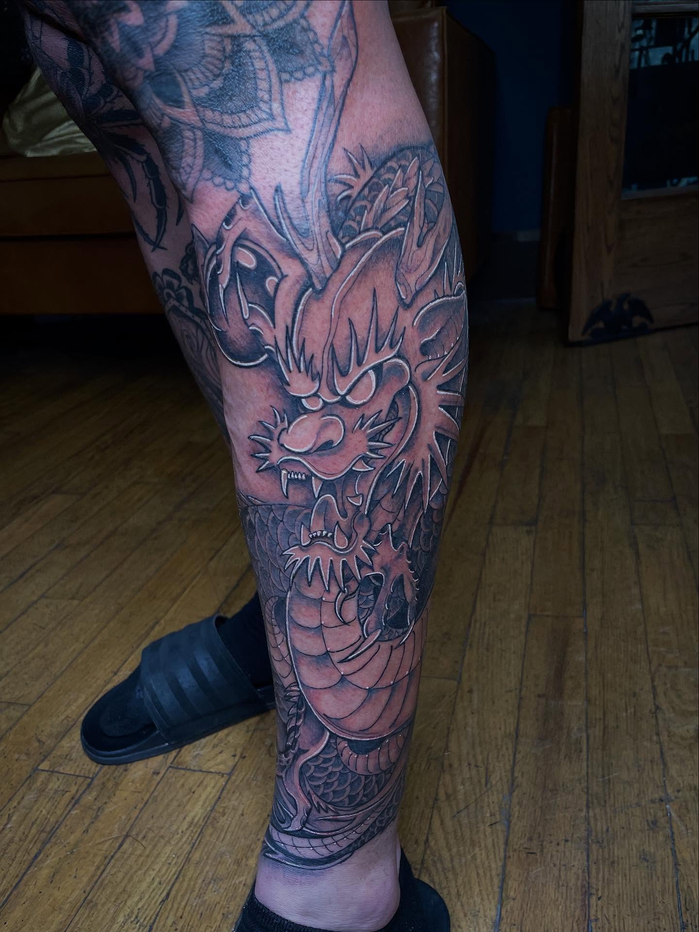 Dragon japanese irezumi tattoo on the calf by Lauren Sisouphanh, Canton, Ohio