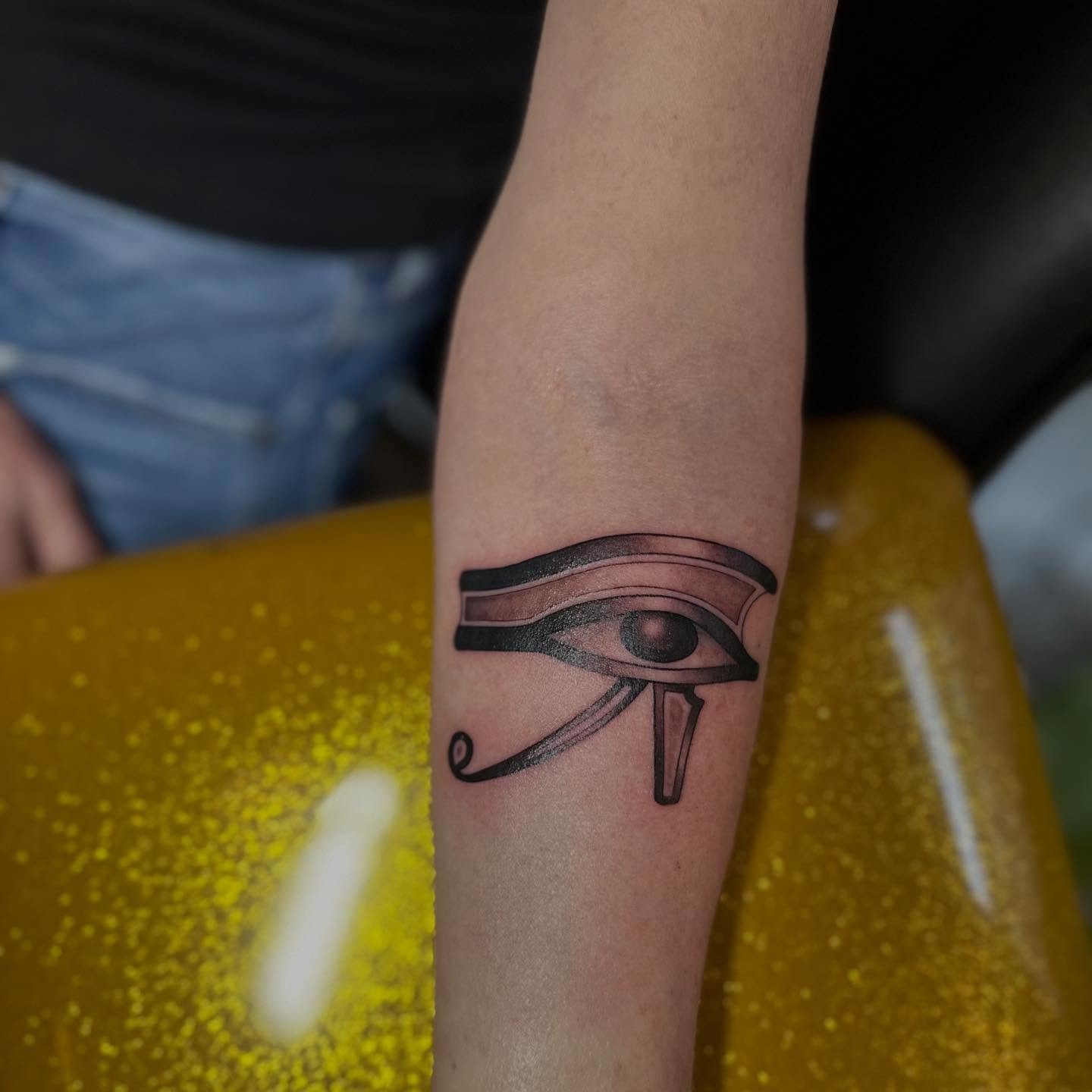 Eye of horus black and grey tattoo on the forearm by Abigail Townsend