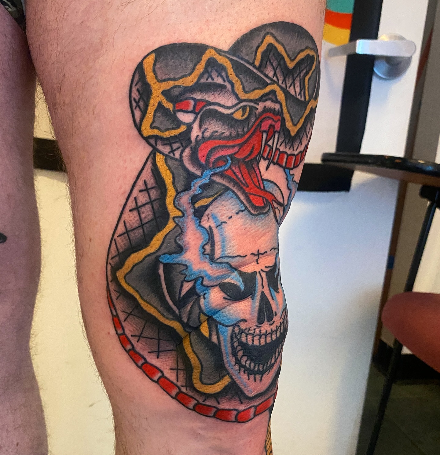 Skull with snake American traditional tattoo on the thigh by atomlenhart, Lancaster, Pennsylvania