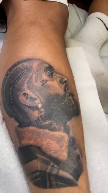 Portrait of Nipsey Hussle realism tattoo by ๐ฝ๐๐๐๐๐๐๐ ๐ถ๐๐๐