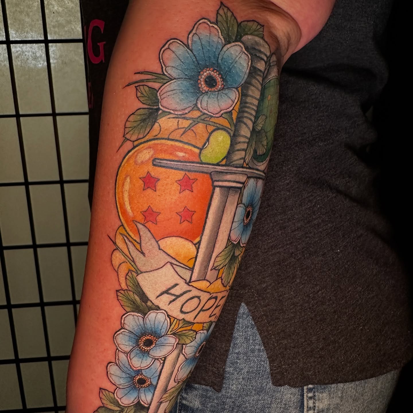Hope American traditional tattoo on the forearm by Robert Douglas