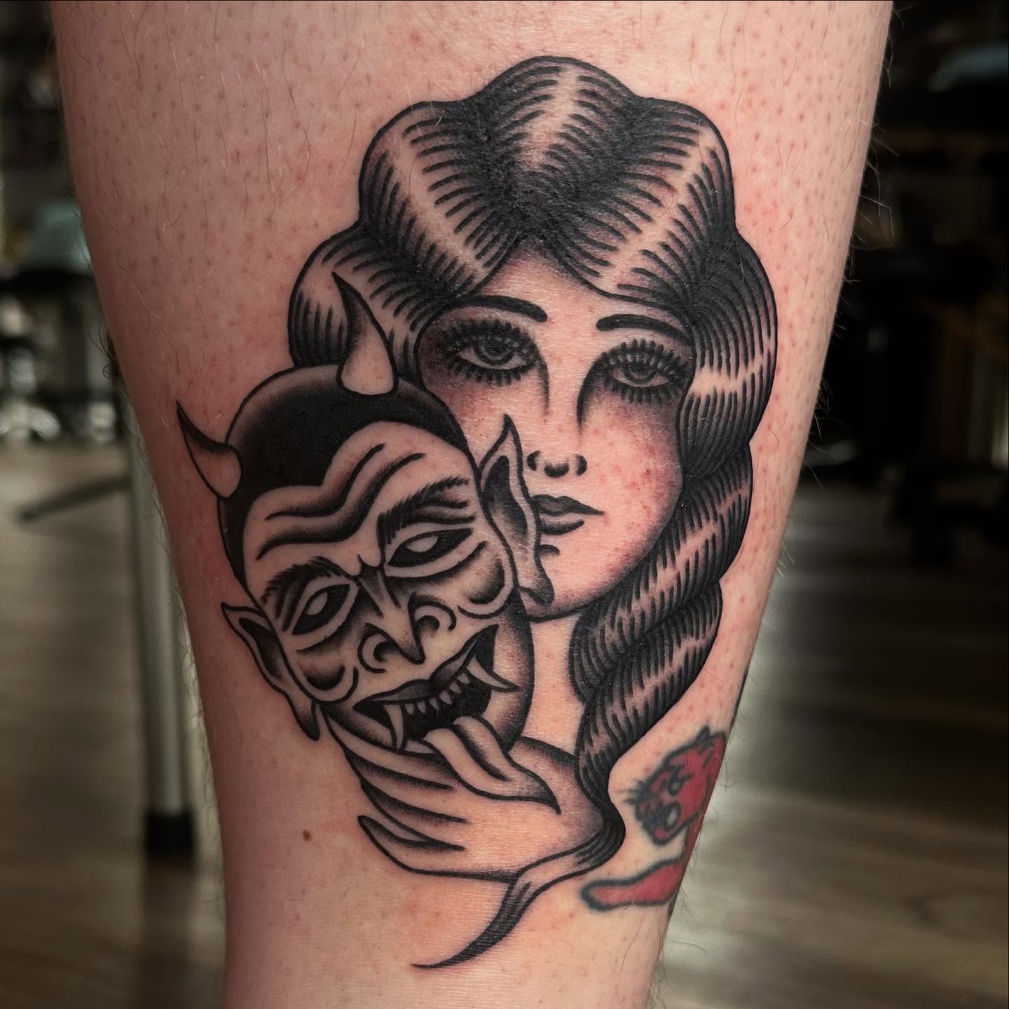 Woman and devil American traditional tattoo on the forearm by Jess Ritchie, Austin, Texas