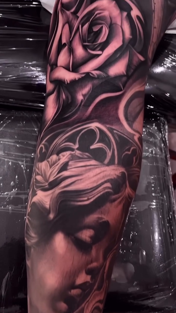 Rose and statue realism tattoo by Erick Gutierrez, Las Vegas, Nevada