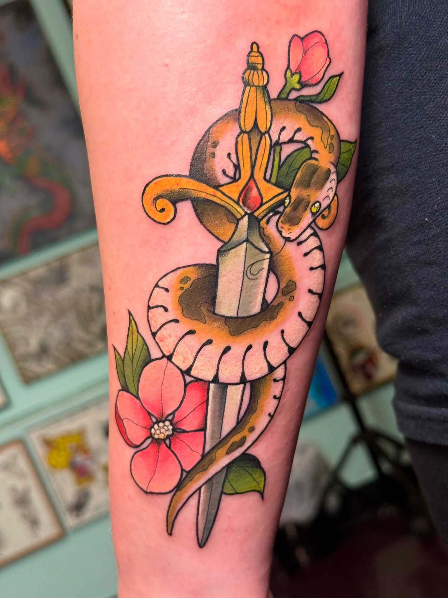 Snake and dagger American traditional tattoo on the forearm by Sophie McTear