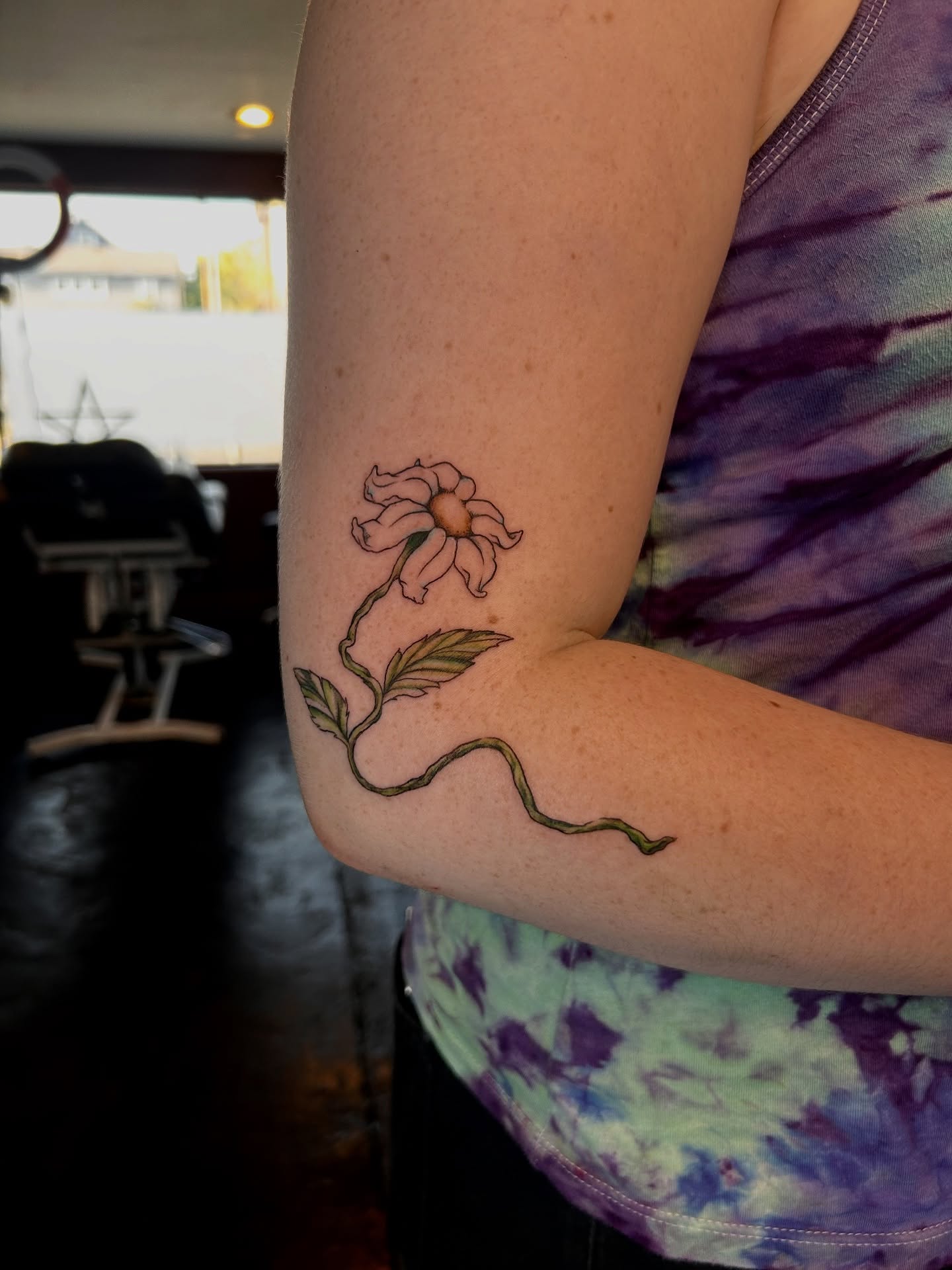 Flower realism tattoo on the forearm by King By Trade 👑