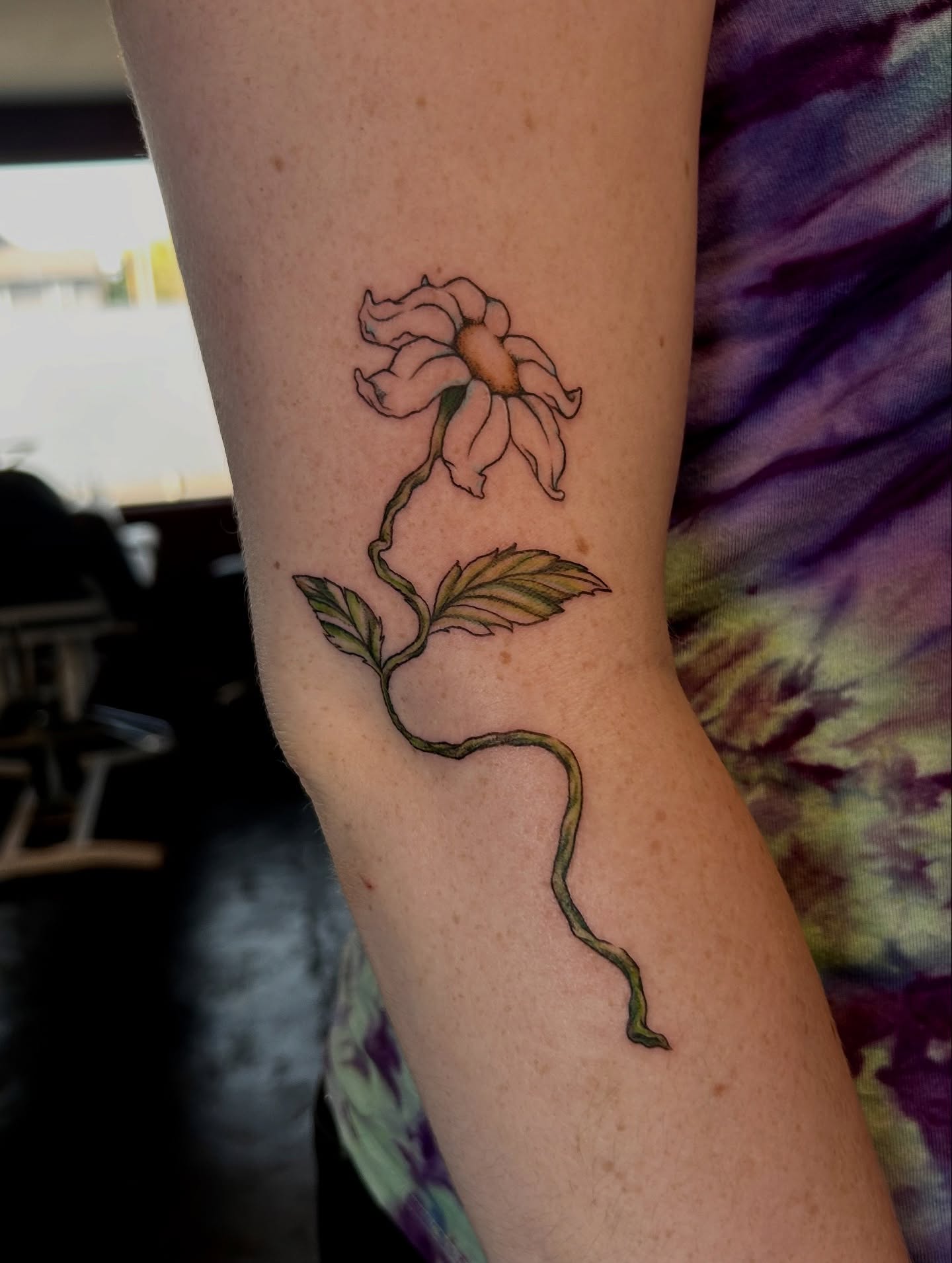 Flower realism tattoo on the forearm by King By Trade 👑