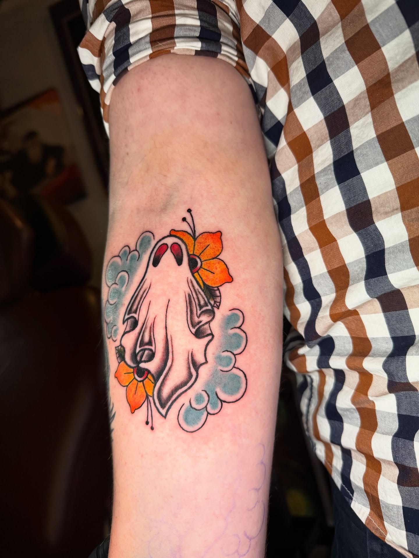 Ghost with flower American traditional tattoo on the forearm by Austin Poliszuk, Minneapolis, Minnesota