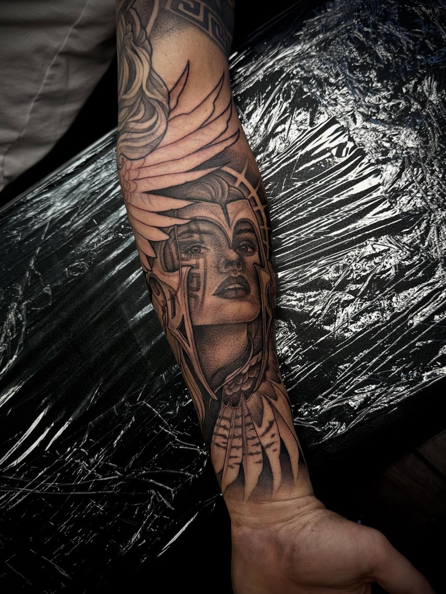 Woman's face realism tattoo on the forearm by Madison Orchard Tattoos