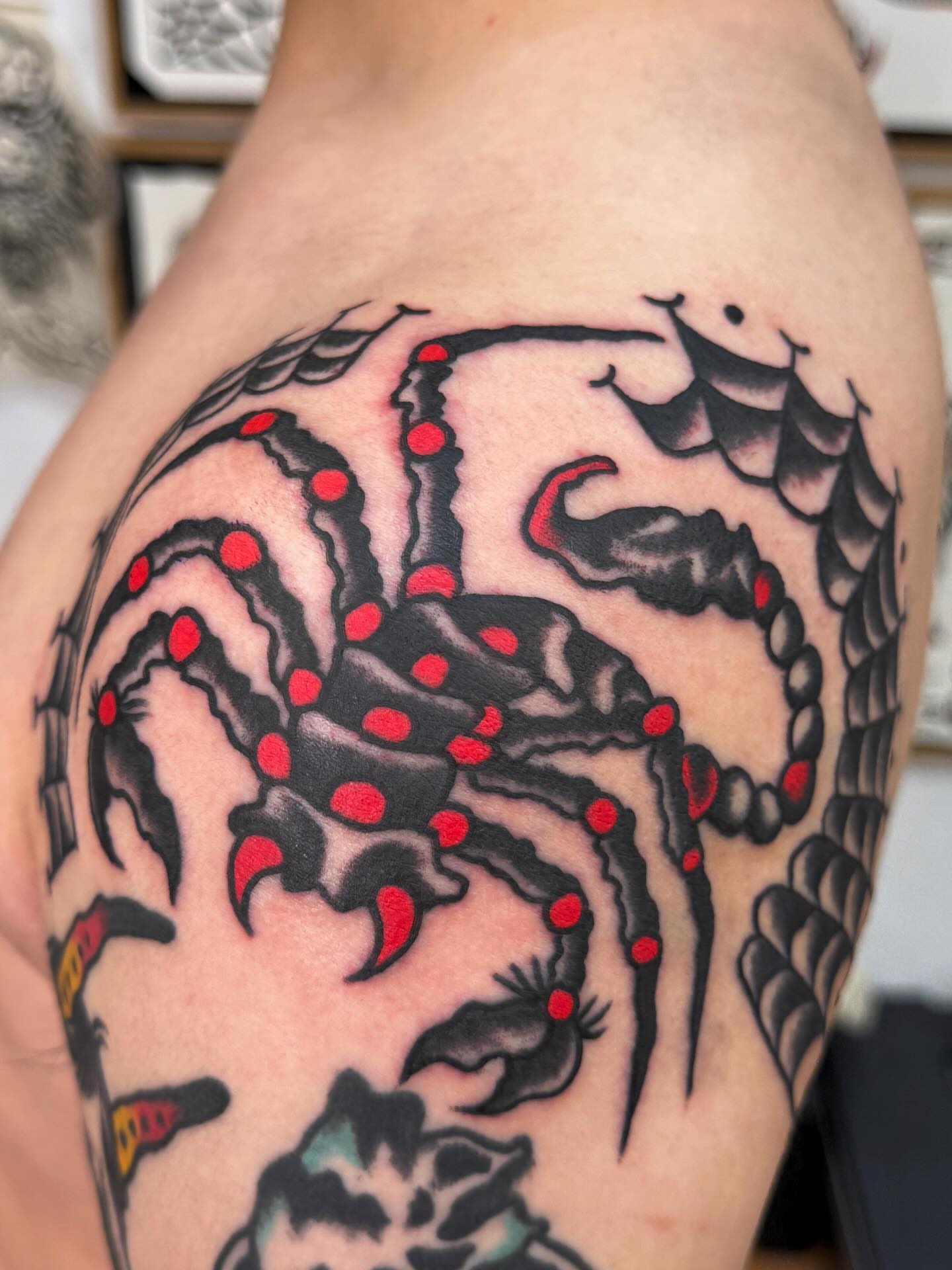 Octopus American traditional tattoo on the shoulder by Jimmy Ho
