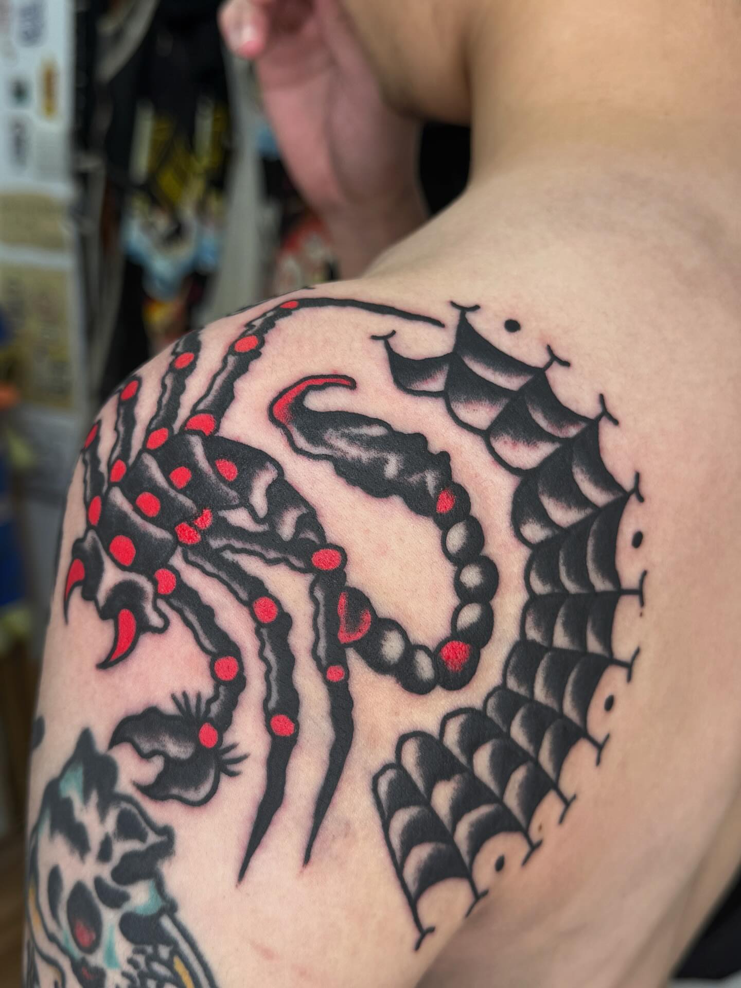 Octopus American traditional tattoo on the shoulder by Jimmy Ho