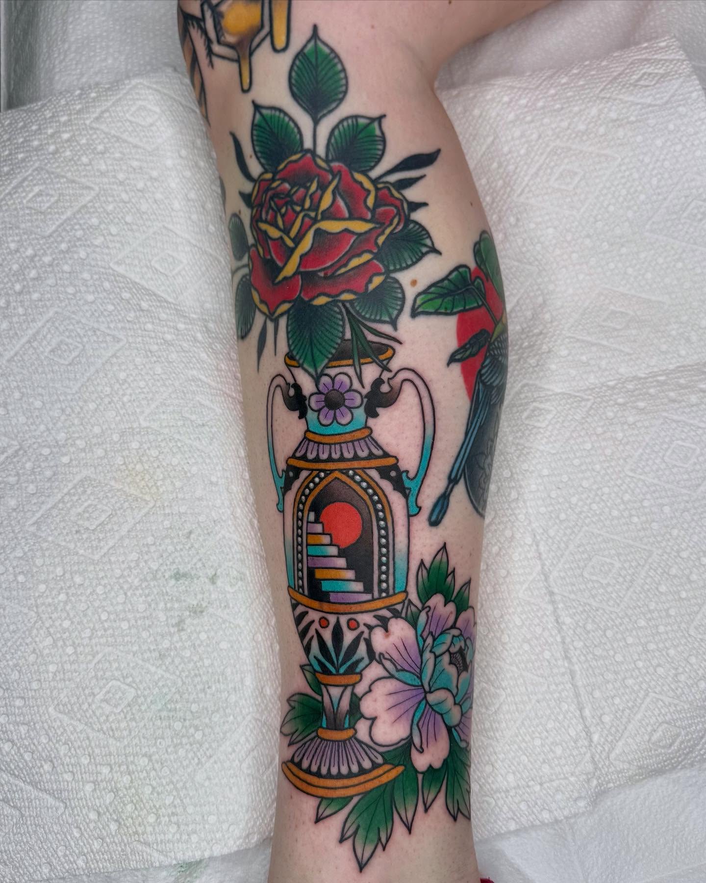 Rose and urn American traditional tattoo on the forearm by Curtis Stairs, Seattle, Washington