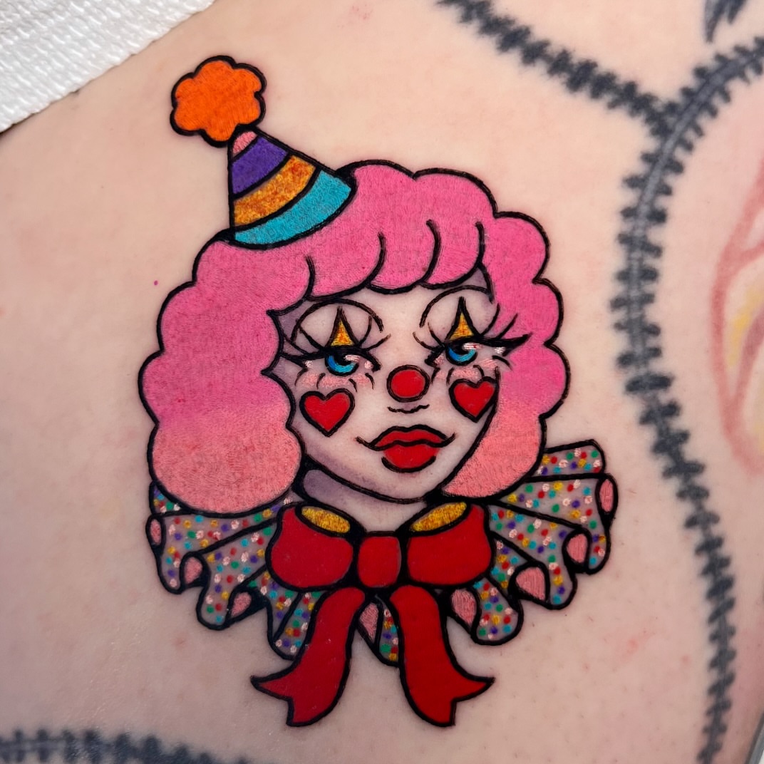 Clown new school tattoo on the forearm by Alena McDonald