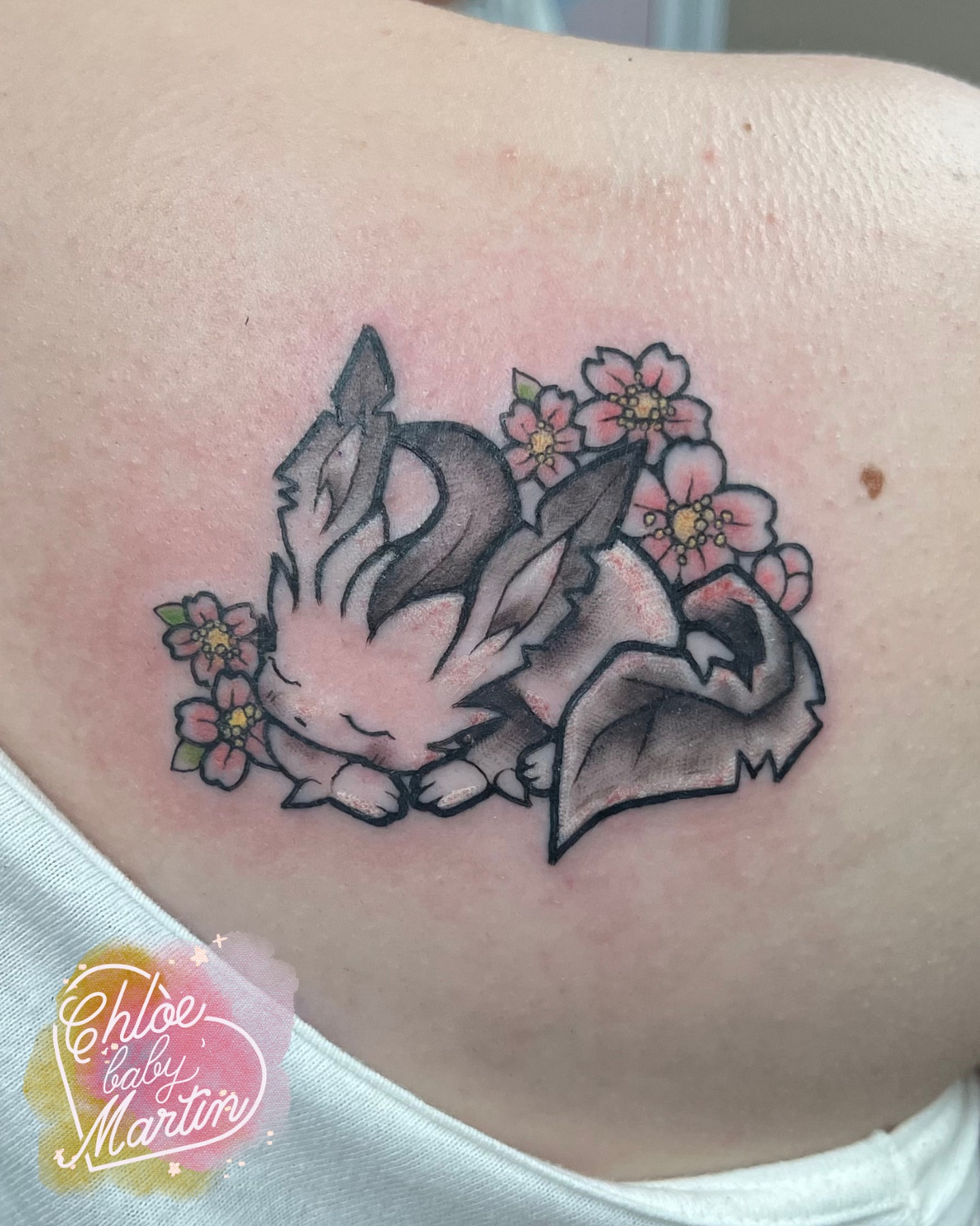 Sleeping fox with flowers dotwork tattoo on the shoulder by Chloe ‘baby’ Martin