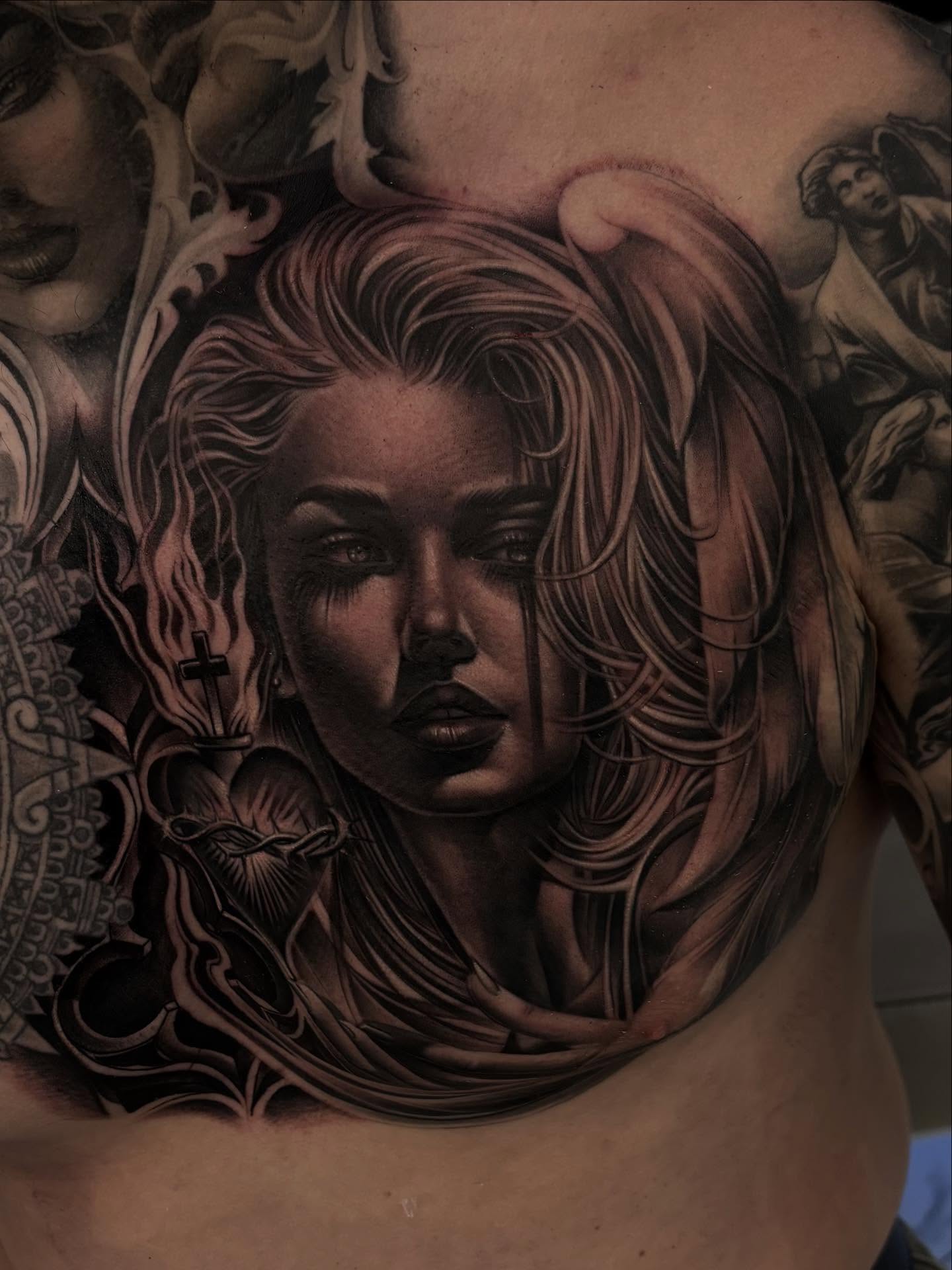 Woman's face realism tattoo on the chest by Jayjay🦅
