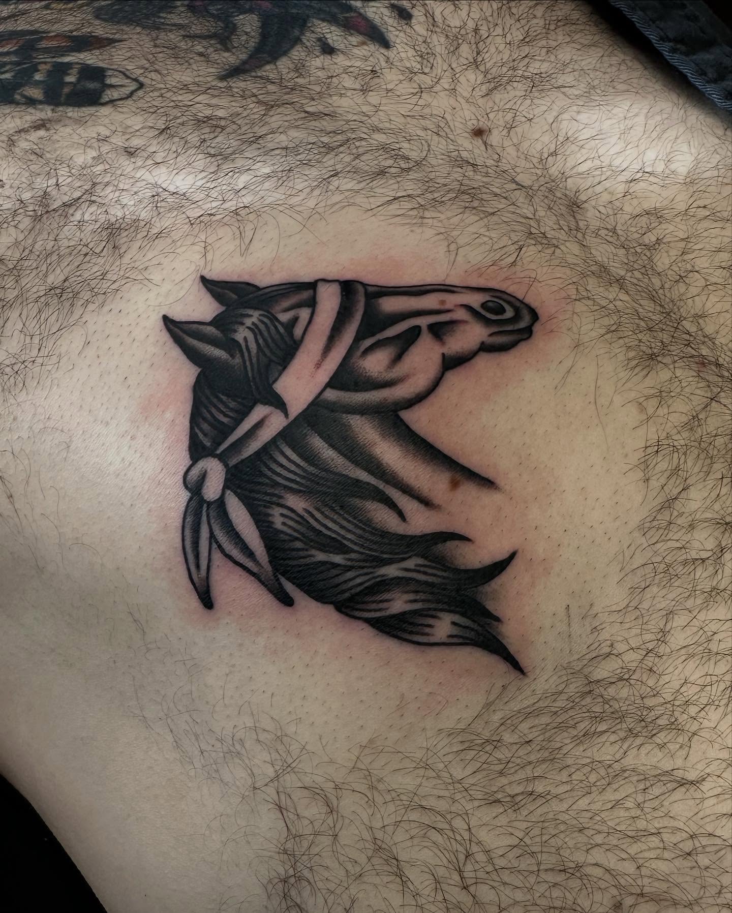 Horse head black and grey tattoo on the thigh by Jess Ritchie, Austin, Texas