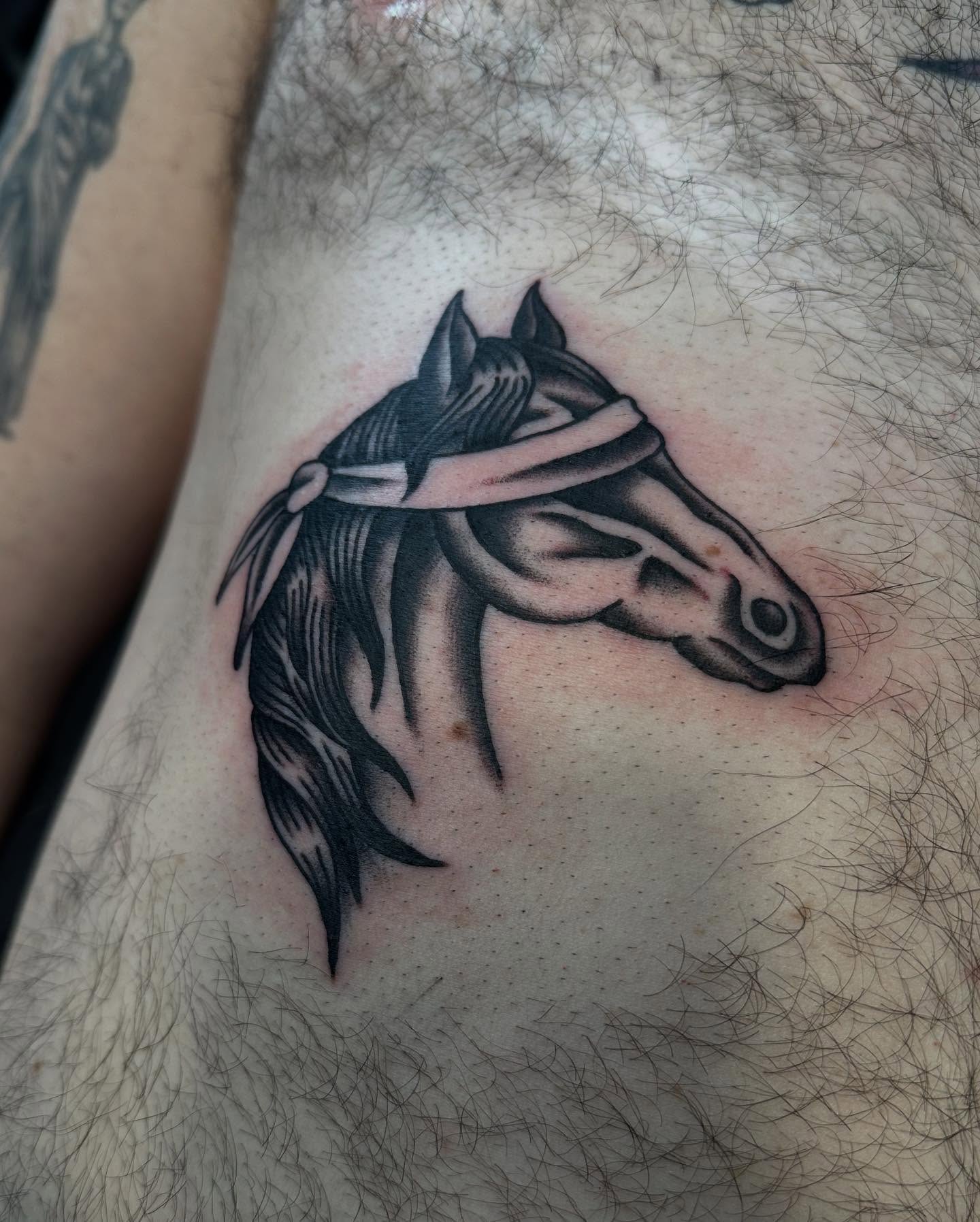 Horse head black and grey tattoo on the thigh by Jess Ritchie, Austin, Texas