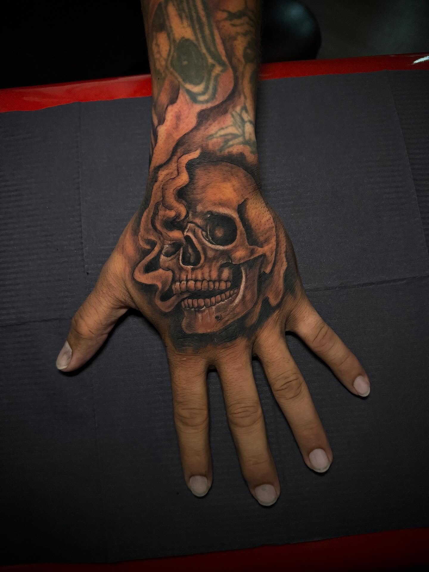 Skull realism tattoo on the hand by Lucky Valenzuela, Lakewood, Colorado