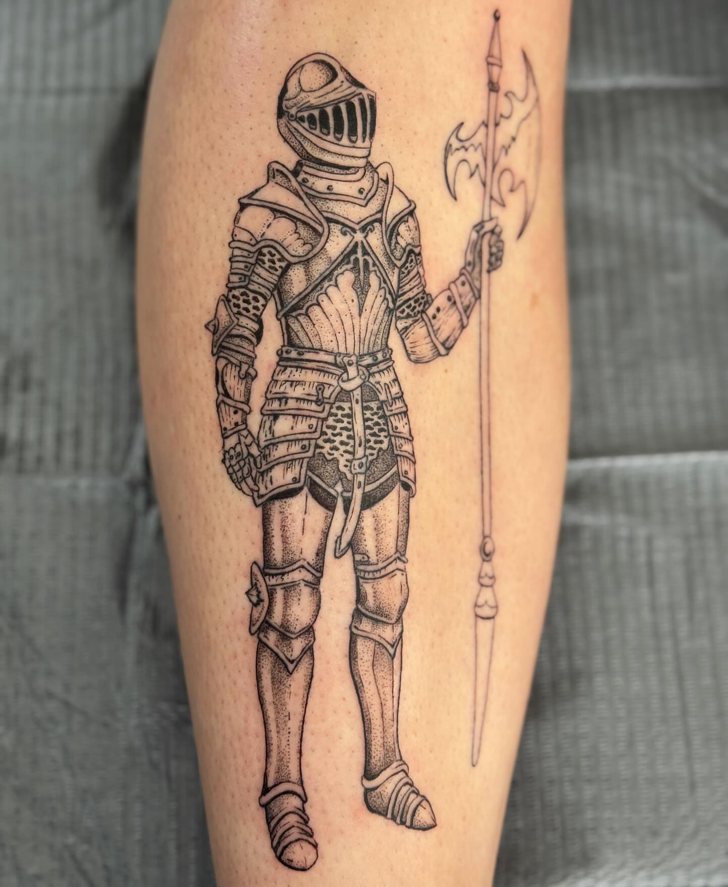 Knight in armor dotwork tattoo on the leg by Writhe Grey
