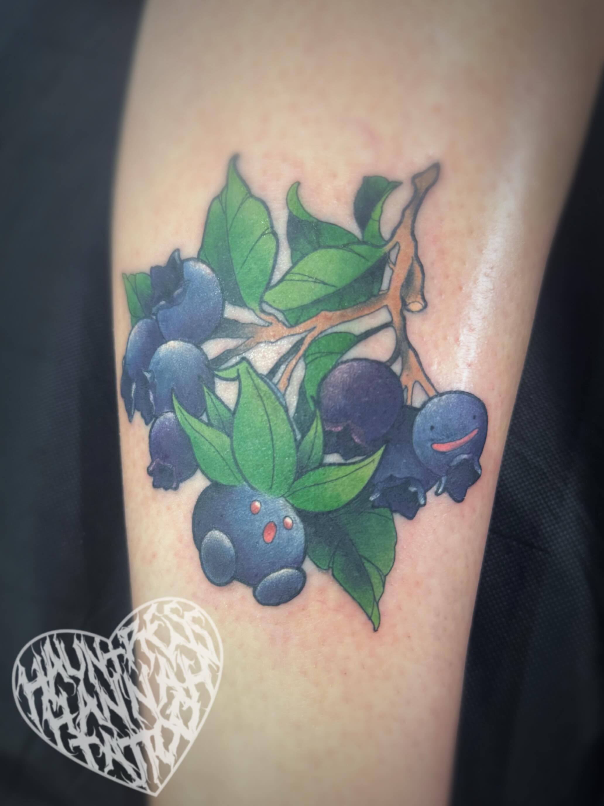 Blueberries realism tattoo on the forearm by Hannah Casadonti