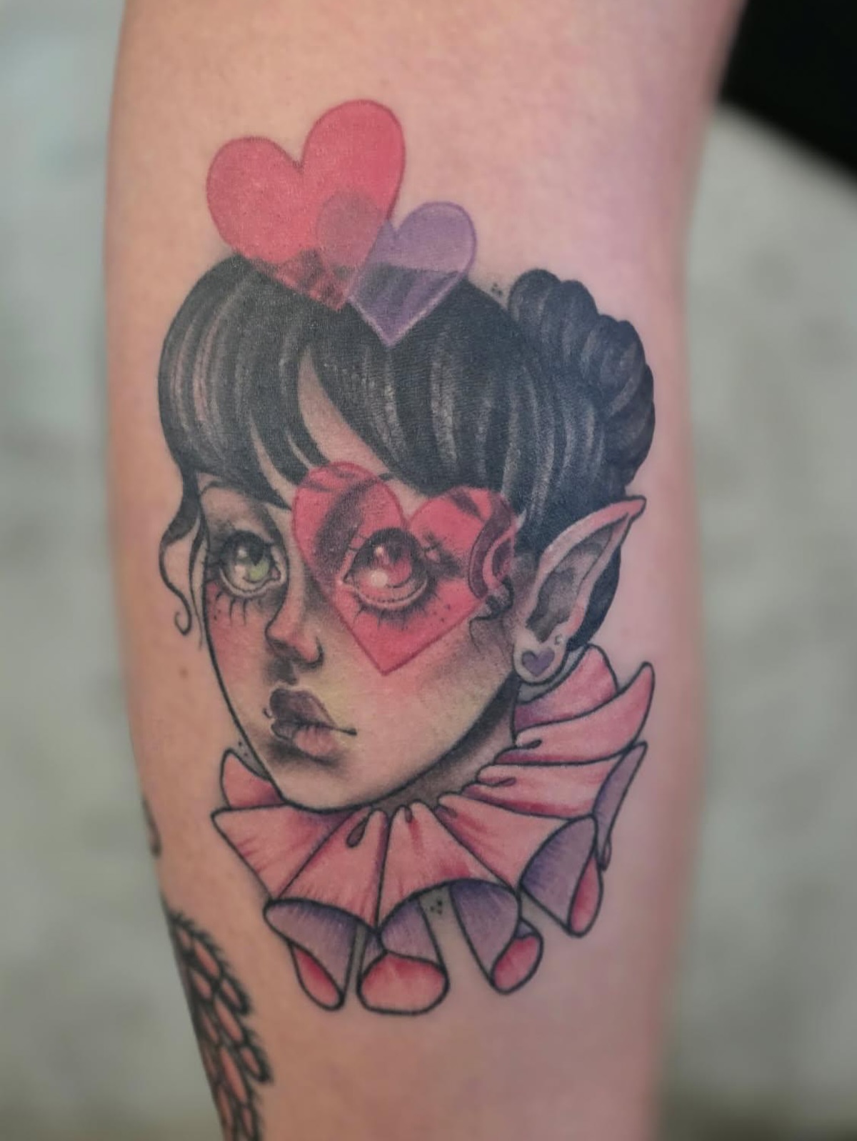 Doll-like face illustrative tattoo on the forearm by Maia Papaya Tattoos 🐝 Olympia Tattoo Artist