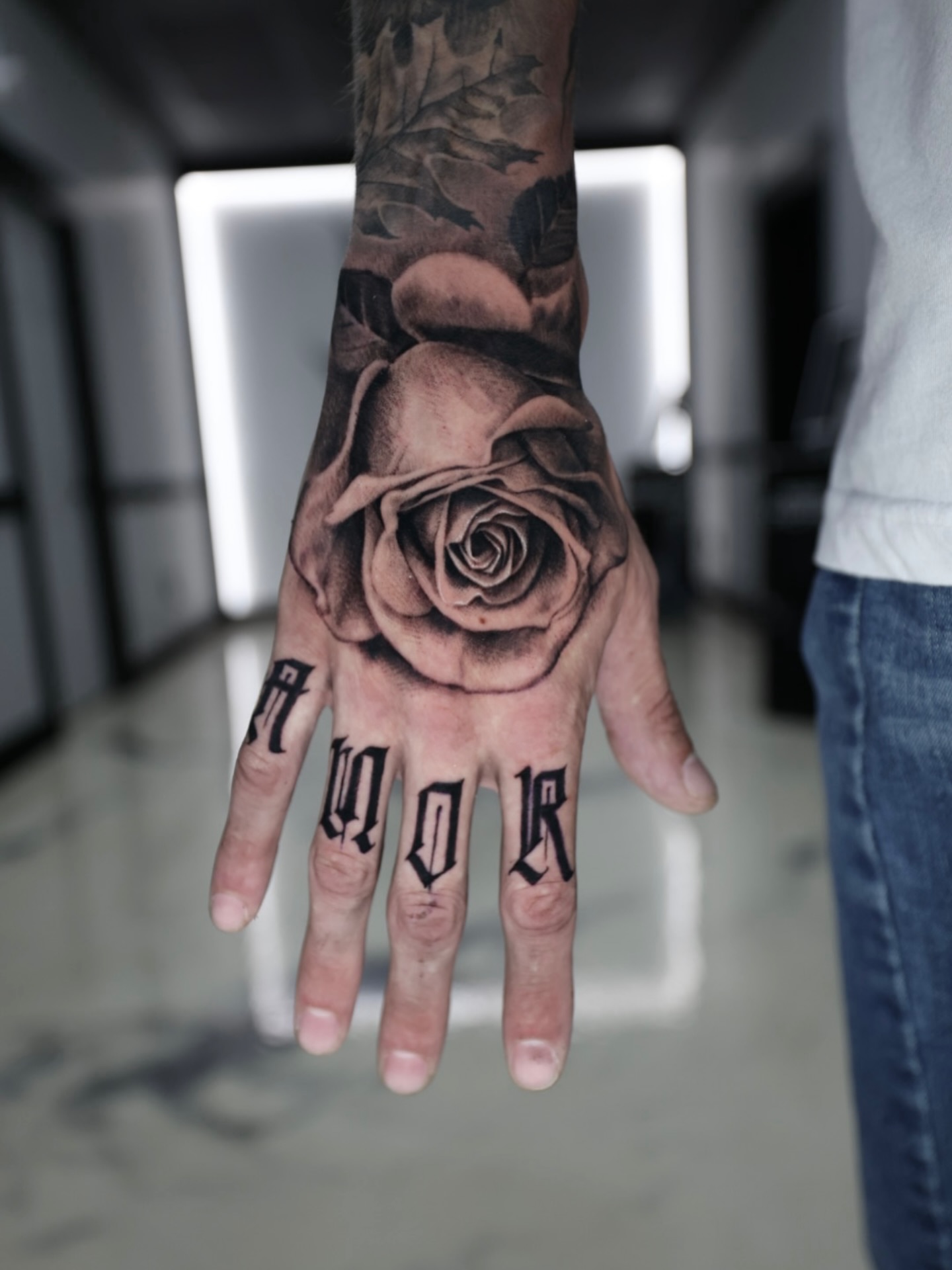 Rose realism tattoo on the hand by Matthew Brown, Londonderry, New Hampshire