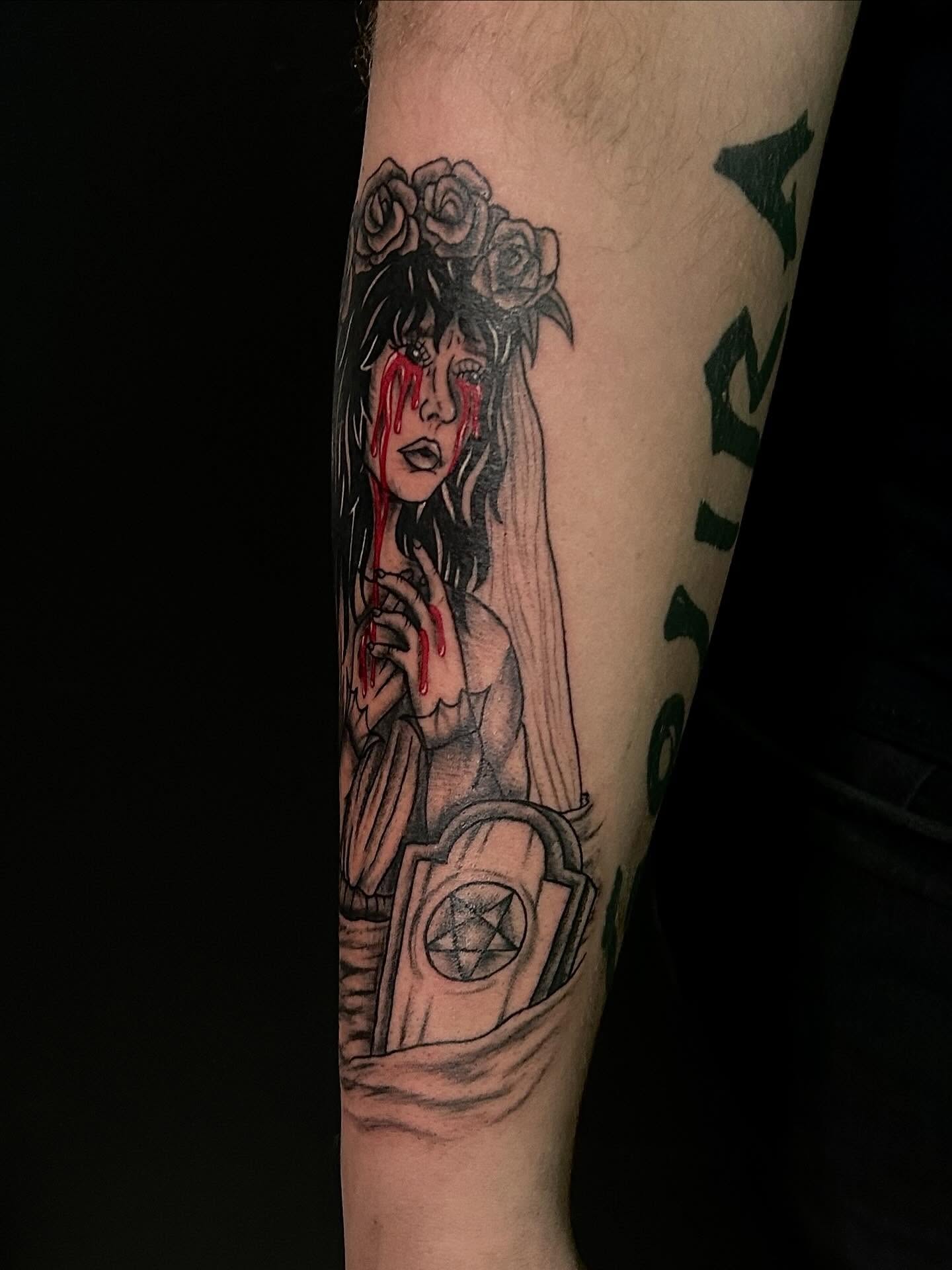 Woman with roses dark realism tattoo on the forearm by Kenadee